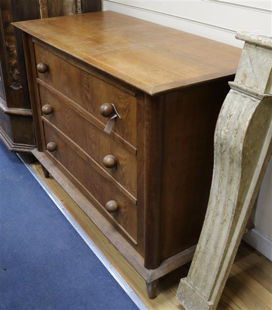 A Continental ash three drawer chest W.120cm